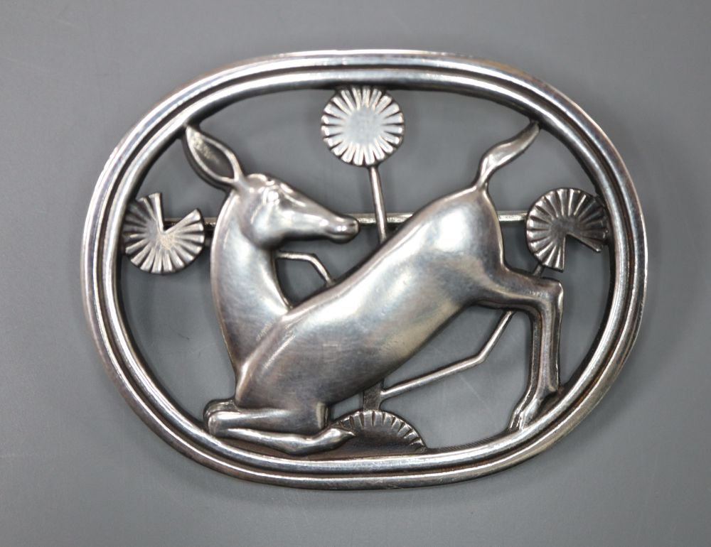 A Georg Jensen sterling kneeling deer oval brooch, no. 256, 42mm, 12.2 grams.